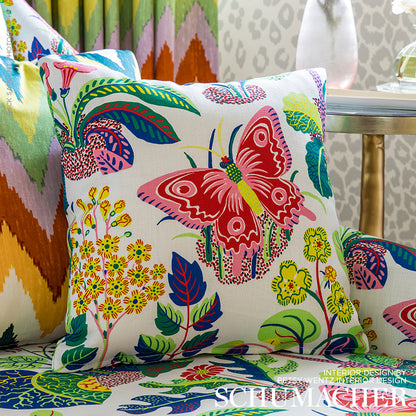 Exotic butterfly and floral print on white linen fabric; vibrant greens, pinks, and blues in a tropical design.