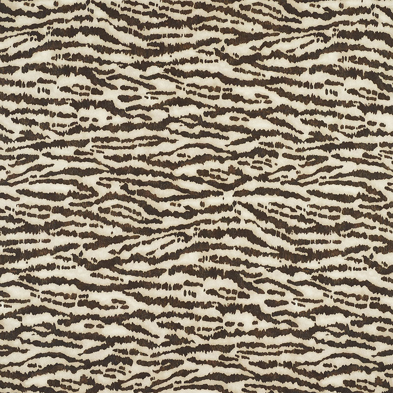 Beige faux fur fabric with dark brown zebra stripes; animal-print textile.