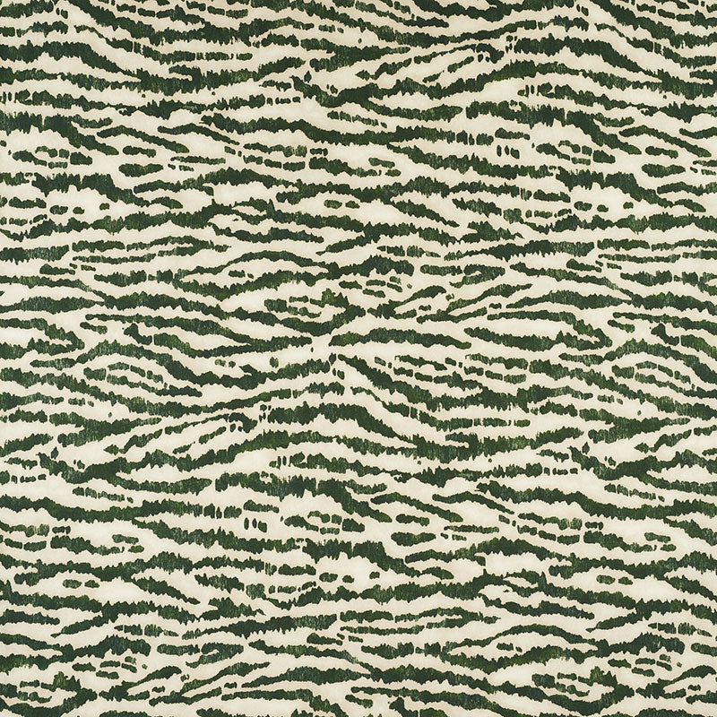 Beige fabric with dark green zebra-like stripes, bold upholstery textile.