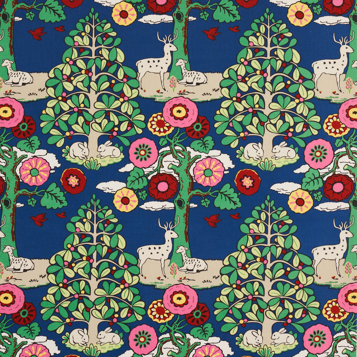 Bright blue fabric with whimsical woodland print: deer, rabbits, stylized trees and vivid pink, red, yellow flowers.