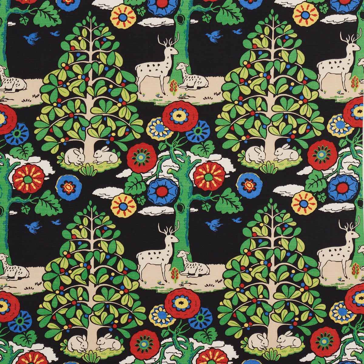 Black fabric with whimsical woodland print: green trees, beige deer and rabbits, and colorful red, blue, yellow flowers.