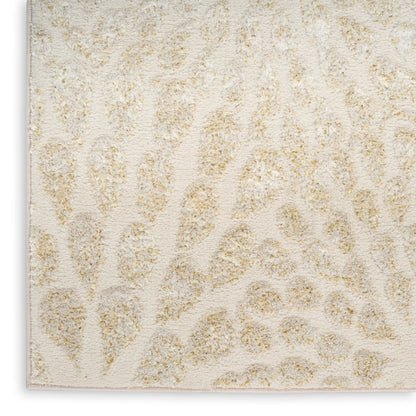 Cream rug with a light beige leopard print and plush textured surface.