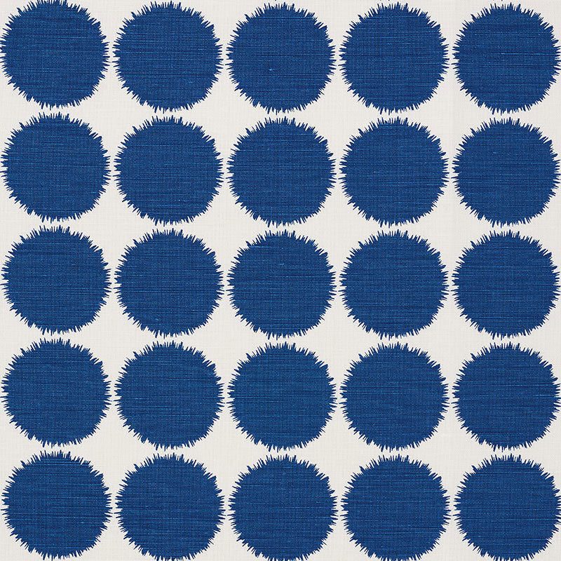 Cream woven fabric with a grid of navy blue circles featuring jagged, fringe-like edges.
