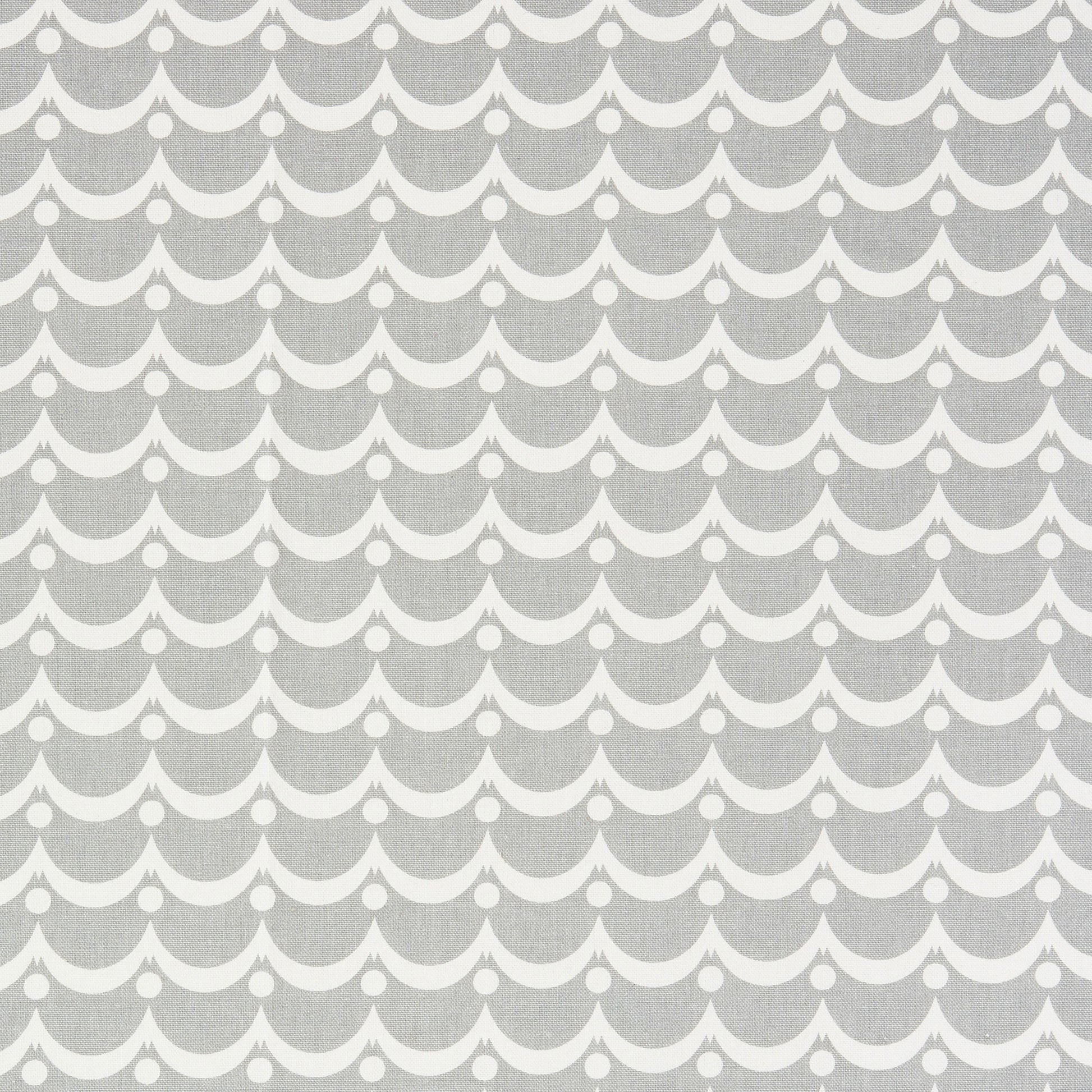 Gray fabric with a repeating white scalloped arc pattern and small white dots.