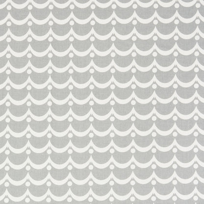 Gray fabric with a repeating white scalloped arc pattern and small white dots.