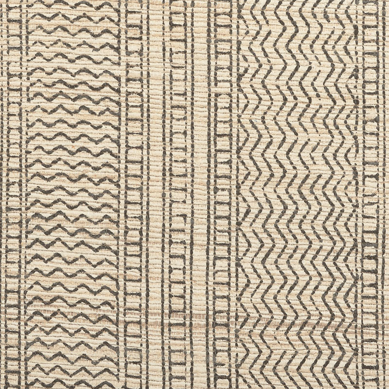 Beige woven rug with black vertical geometric stripes, featuring zigzag and wave motifs.