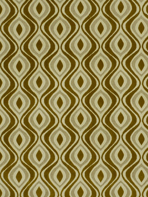 Camel upholstery fabric with a mid-century geometric pattern of olive, gold, and brown teardrop motifs, repeating vertically.