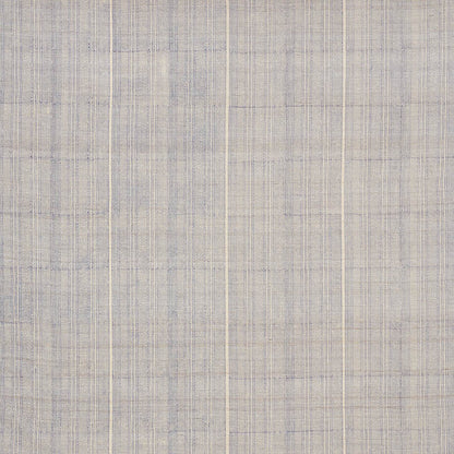 Indigo Mohave print on light blue and beige plaid fabric with a linen-like texture, suitable for drapery or upholstery.