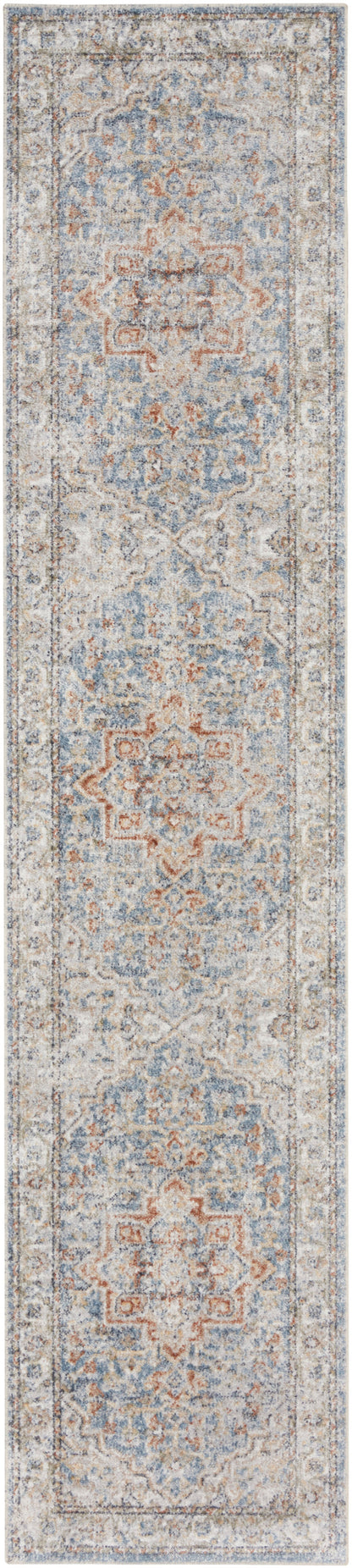 Long beige runner rug with ornate blue and rust medallion motifs and distressed detailing.