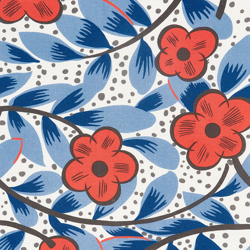 Floral fabric pattern with red five-petal flowers, blue leaves, brown stems on a light gray dotted background.