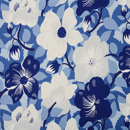 Blue floral pattern with large white and dark blue flowers and leaves; tropical print for fabric, wallpaper, or upholstery.