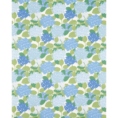 Hydrangea print on porcelain with light and medium blue blossoms and green leaves on a pale background.