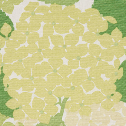 Yellow hydrangea floral pattern on green background, linen-textured fabric.