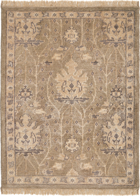 Beige oriental-style rug with a faded central floral medallion, taupe border and fringed ends.