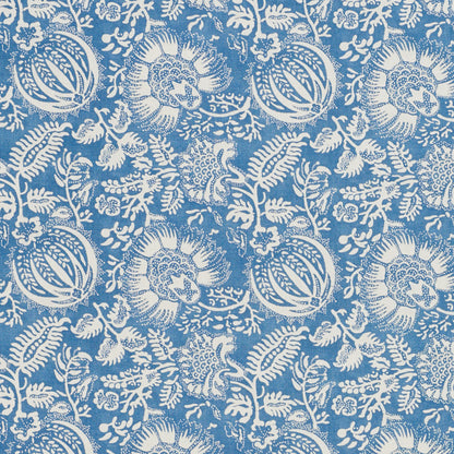 Blue fabric with white damask floral pattern, round medallions and scrolling vines.