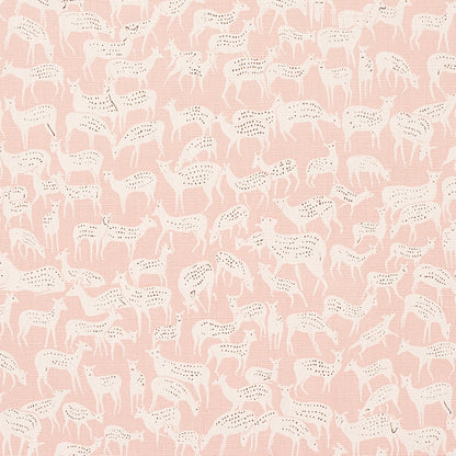 Soft pink fabric with repeating white horse silhouettes and small black spots in a whimsical pattern.