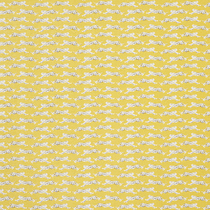 Yellow fabric with repeating white leopard silhouettes in a decorative pattern.