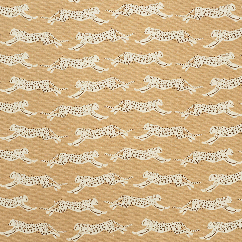 Beige fabric with a repeating pattern of white leopards and black spots in a safari-style print.