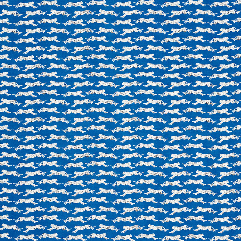 Blue fabric with repeating white leaping leopard silhouettes; seamless, playful leopard-print pattern.