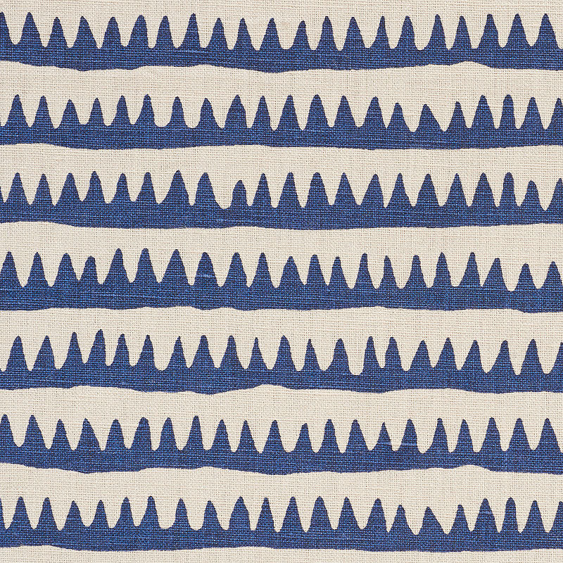 Cream fabric with navy zigzag stripe of triangular shapes; coastal, casual textile for upholstery, pillows, or curtains.