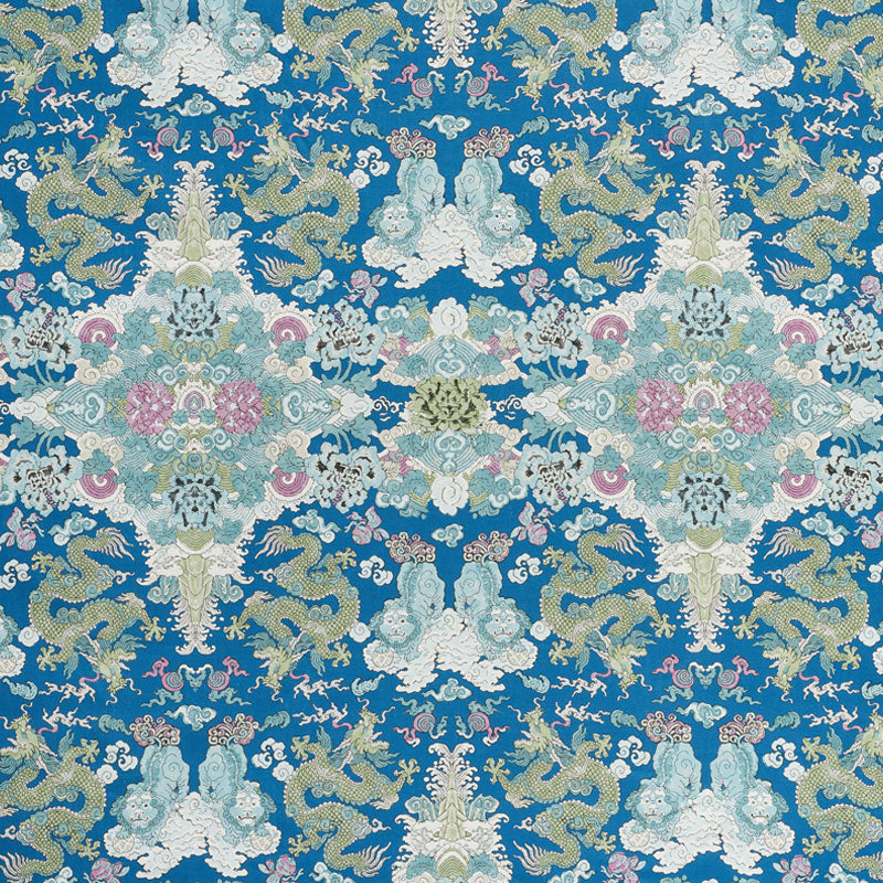 Blue damask fabric with gold & mint dragons & pastel florals in an ornate symmetrical chinoiserie pattern.