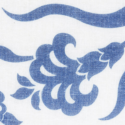 Blue ornamental floral damask pattern with curved vines and leaves, textile-inspired design.