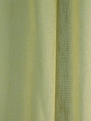 Light pistachio woven fabric with a small square-grid texture and soft draped folds.