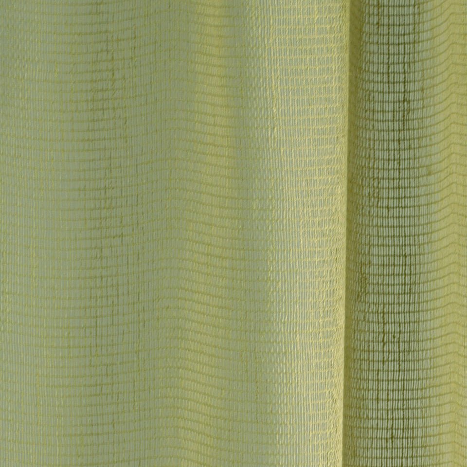 Close-up of lime-yellow woven fabric with grid texture and vertical folds; two-tone light to dark yellow-green.