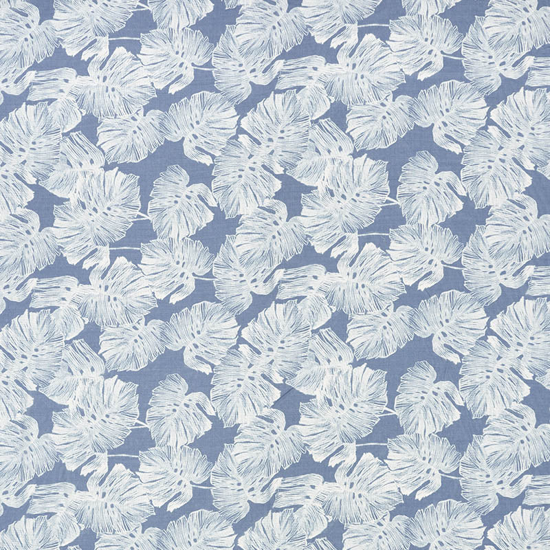 Dusty blue fabric with a repeating white monstera leaf pattern; tropical botanical print.