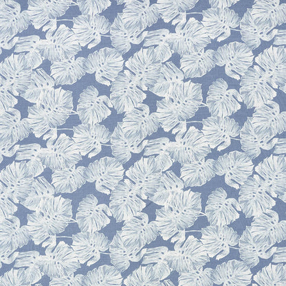 Dusty blue fabric with a repeating white monstera leaf pattern; tropical botanical print.