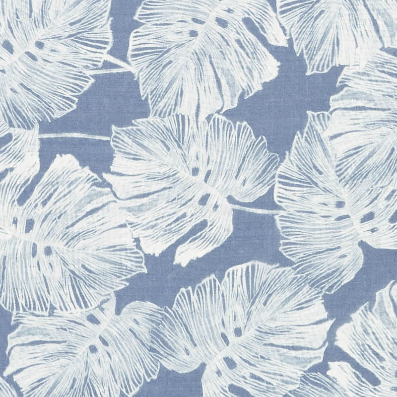 Blue fabric with white tropical leaf print featuring large Monstera-like leaves.