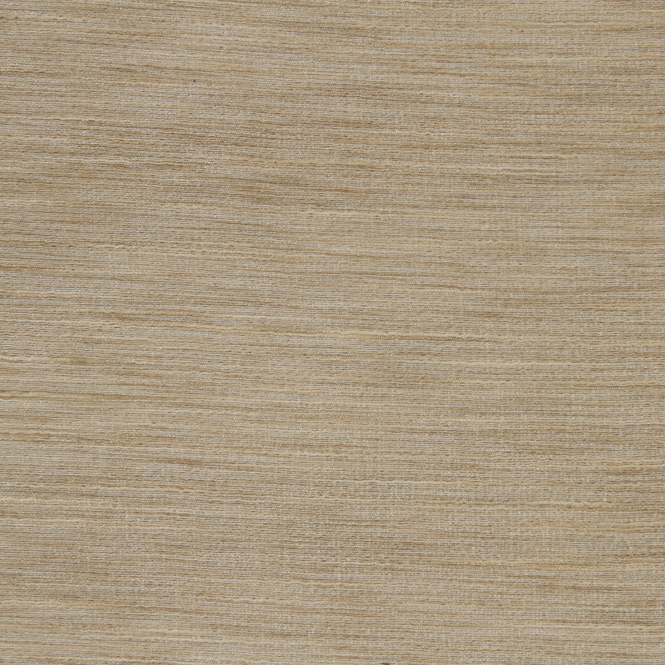 Light parchment-colored textured surface with a subtle grain pattern.
