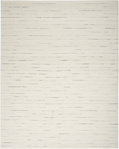 Cream flat-weave rug with scattered thin charcoal lines; minimalist modern rectangle for living room or bedroom.