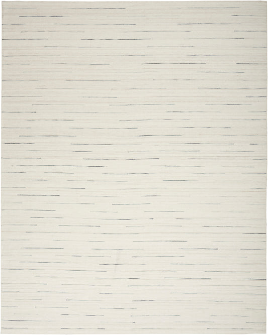 Cream flat-weave rug with scattered thin charcoal lines; minimalist modern rectangle for living room or bedroom.