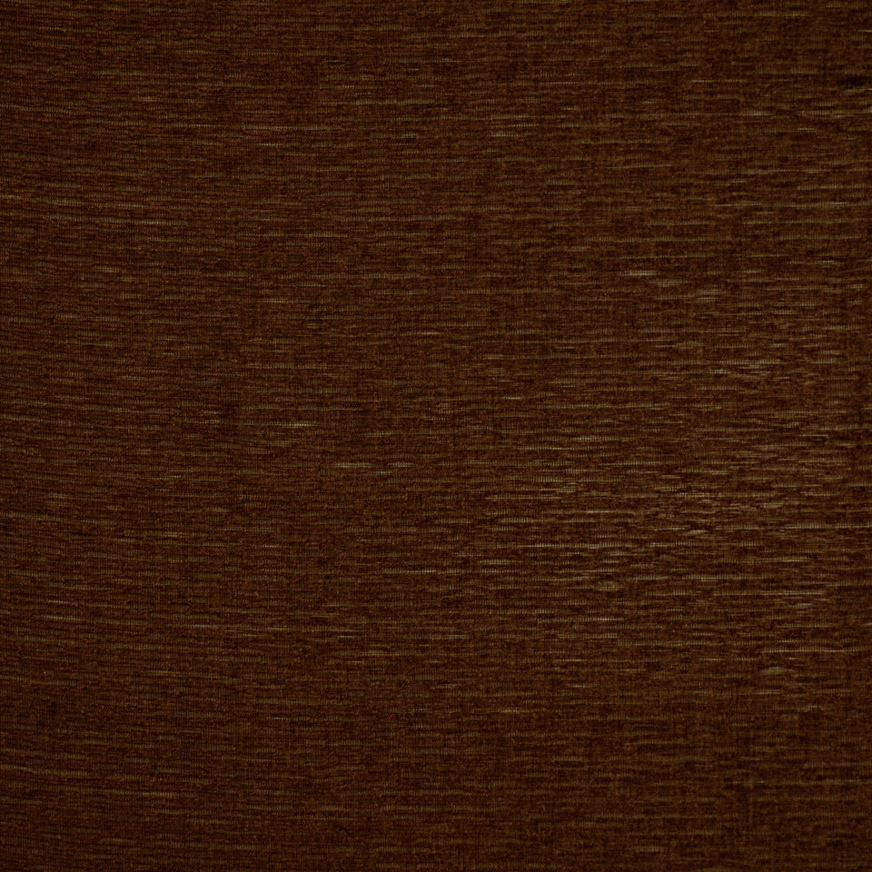 Close-up of dark brown drapery fabric with fine weave and smooth finish.