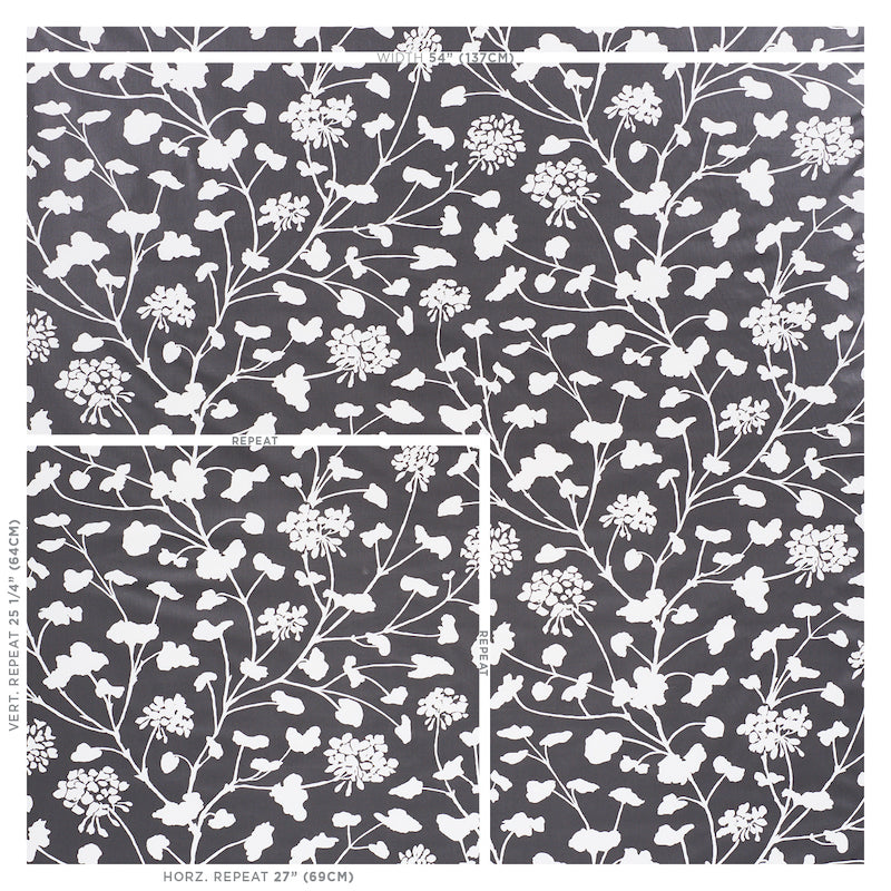 Black fabric with white botanical floral print; dense vine-cluster pattern for upholstery or decor.
