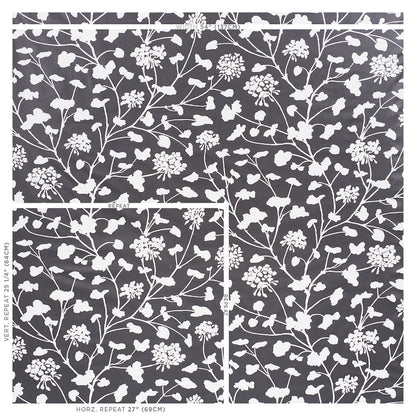 Black fabric with white botanical floral print; dense vine-cluster pattern for upholstery or decor.