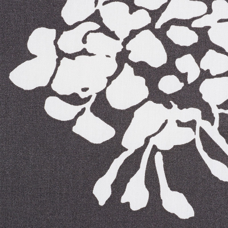 Black woven fabric with a bold floral chintz print.