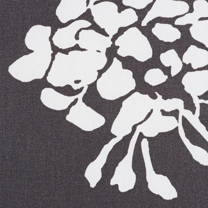 Black woven fabric with a bold floral chintz print.
