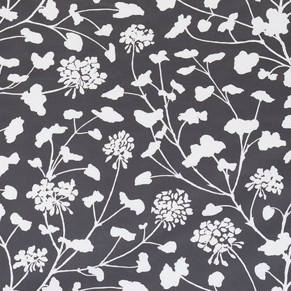 Dark gray fabric with white botanical floral pattern of branching stems and clustered blooms.