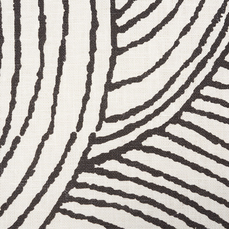 Cream fabric with bold black wavy stripe pattern, zebra-inspired textile design for upholstery or decor.