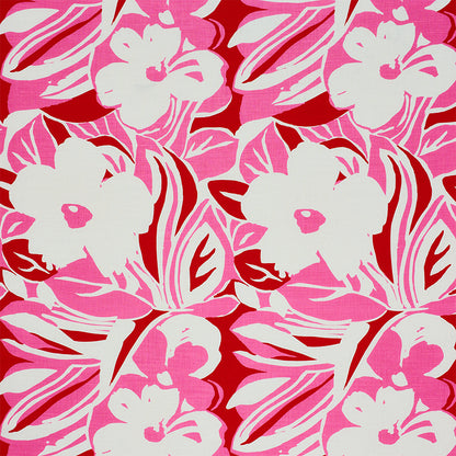 Vibrant pink and white hibiscus floral print against red; bold tropical fabric pattern with large petals.