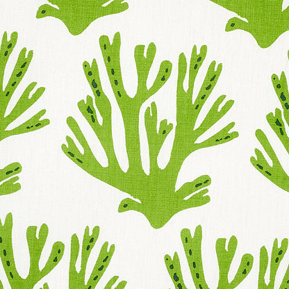 Bright lime green coral-branch pattern repeats on light fabric; tropical botanical textile design.