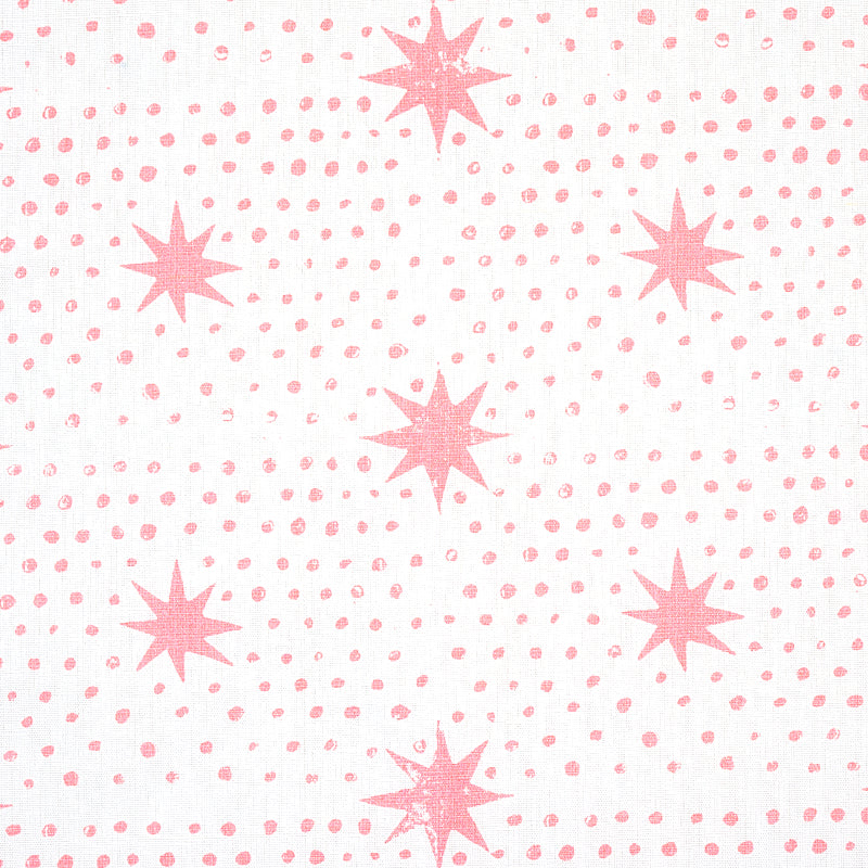 White fabric with pink eight-point starburst motifs and small dot accents; playful geometric print for textiles.