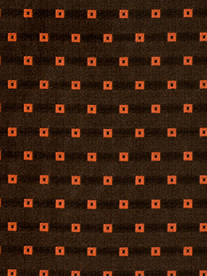 Dark brown fabric with a repeating small orange square motif in a geometric retro pattern; ideal for upholstery or garments.