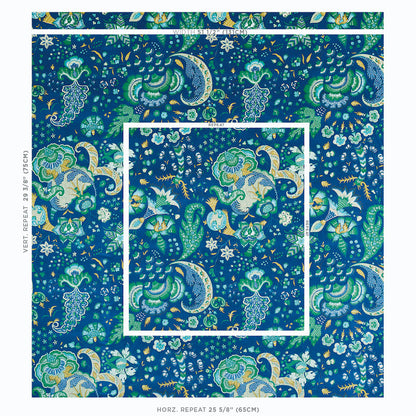 Blue velvet fabric with a vibrant paisley floral pattern in teal and turquoise, featuring crescent motifs.