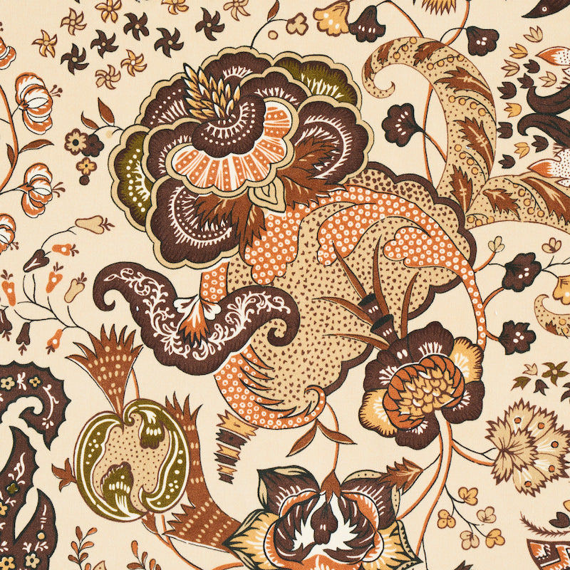 Vintage-inspired paisley floral velvet fabric in cream, brown, orange and olive tones with swirling blossoms and leaves.
