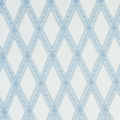 Blue diamond lattice wallpaper with delicate floral scroll accents on white background.