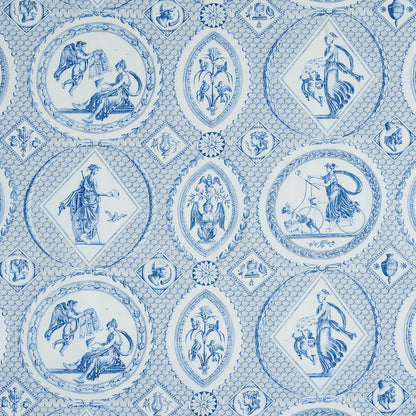Blue and white patterned wallpaper featuring circular medallions with classical figures and floral motifs.