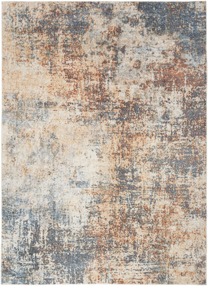Abstract distressed area rug blending beige, rust and blue for a vintage, weathered look.